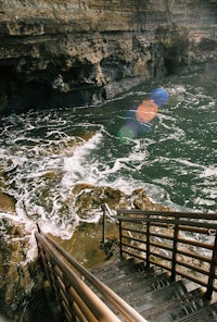 stairs leading up to a cliff